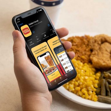 GC-LoyaltyReboot-FBIG-FeedPost-Carousel Person using the Golden Corral app
